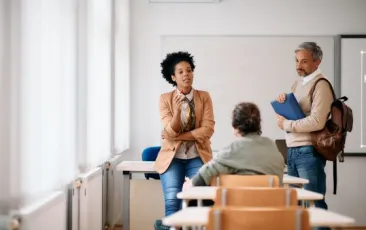 Teacher talking to students in the classroom