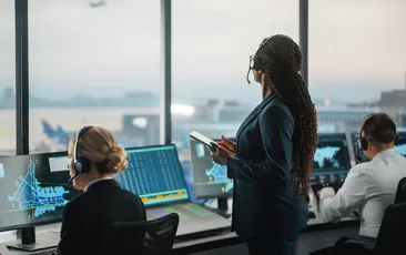 air traffic controllers overlooking airport