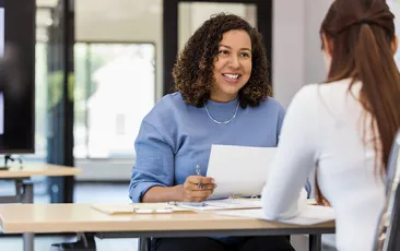 Employer interviewing job candidate