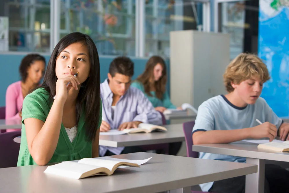 Students taking test in classroom