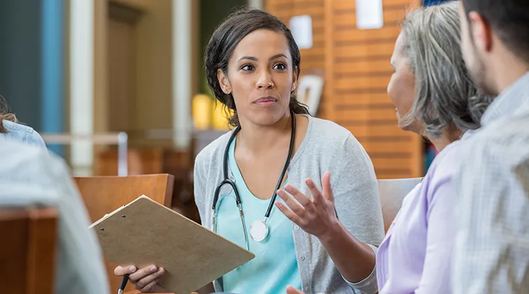 Doctor talking with patients
