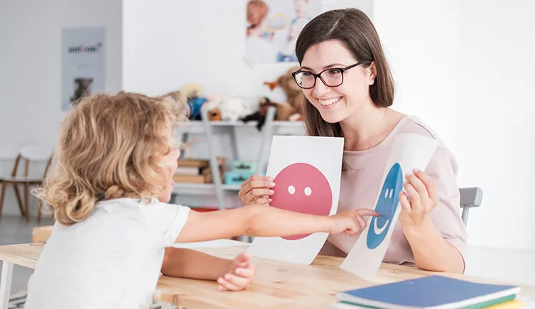 School therapist with young student