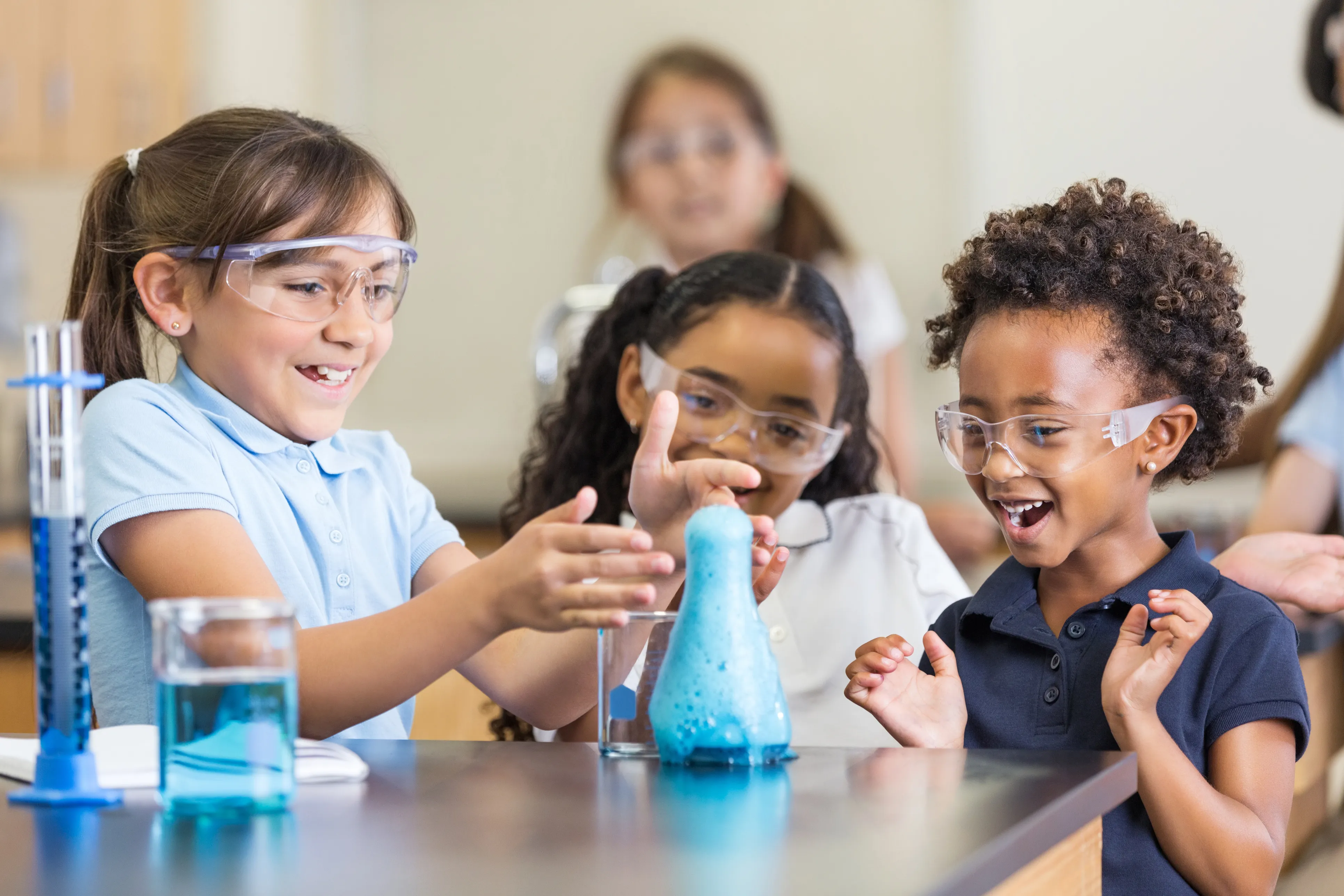 Two little girls doing a science experiment