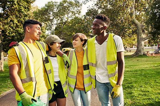 Youth working in a park together