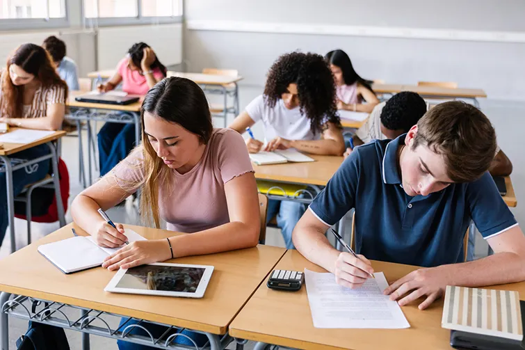 high school student doing schoolwork 