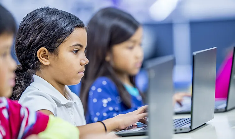 Elementary students in computer class