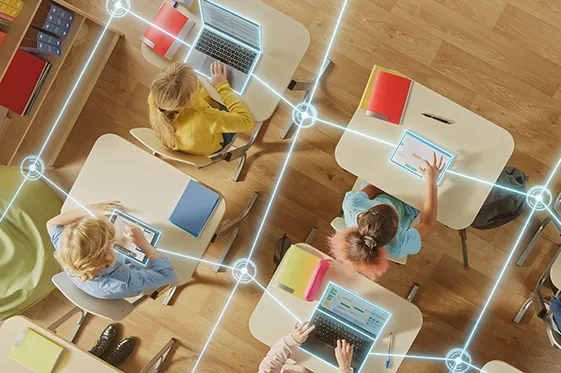 Students in a classroom connected by digital links
