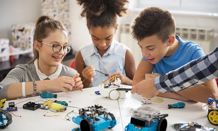 Kids working on a robotics project