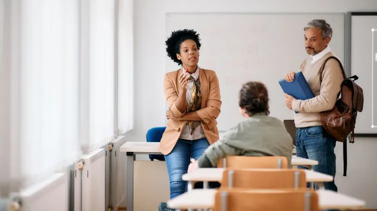 Teacher talking to students in the classroom