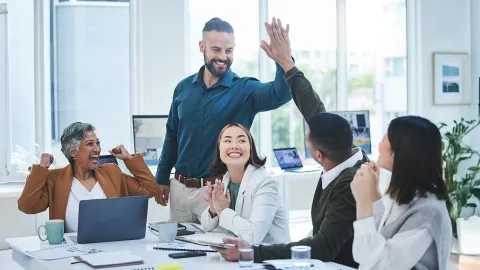 Excited group of colleagues