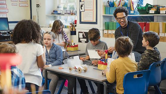 Teacher with young students