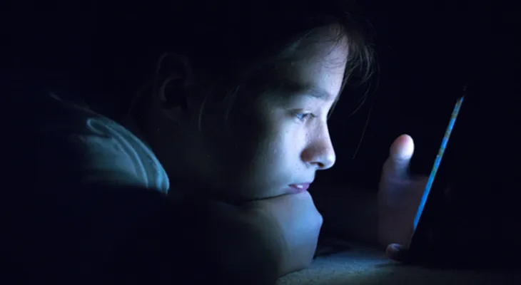 Girl looking lonely in the dark