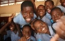 young Haitian students laughing 