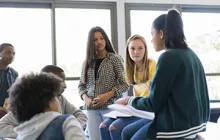 Image of students working together 