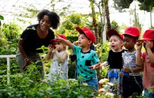 Young children working in a garden