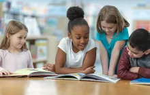 Kids reading together in school