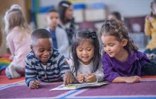 Three kids reading