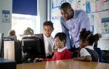 Computer science teacher with young students