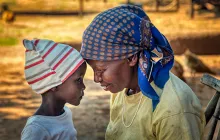 African granny together with her granddaughter