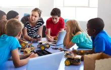 Students In After School Computer Coding Class Building And Learning To Program Robot Vehicle