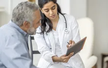 health care visit with senior man