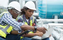 Construction apprentice with her trainer
