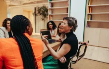 Administrators meeting in conference room