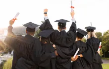 High school graduates looking into the sunshine