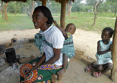 Image of mother in Zambia with young children