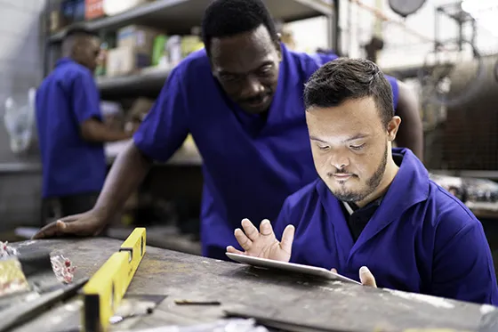 Mentor and apprentice with a disability